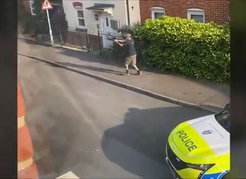 Man fires crossbow at police officer after stabbing neighbour