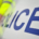 A general stock image of a police car and officer