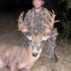 An Oklahoma hunter with a big buck with lots of points