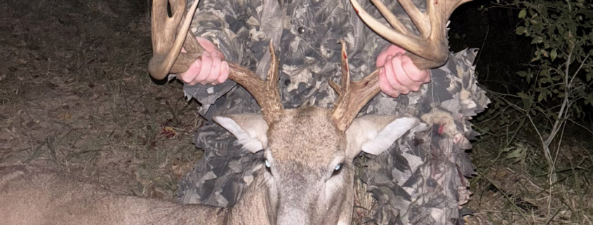 An Oklahoma hunter with a big buck with lots of points