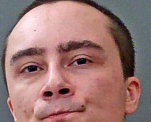 Man charged with pointing crossbow while threatening others